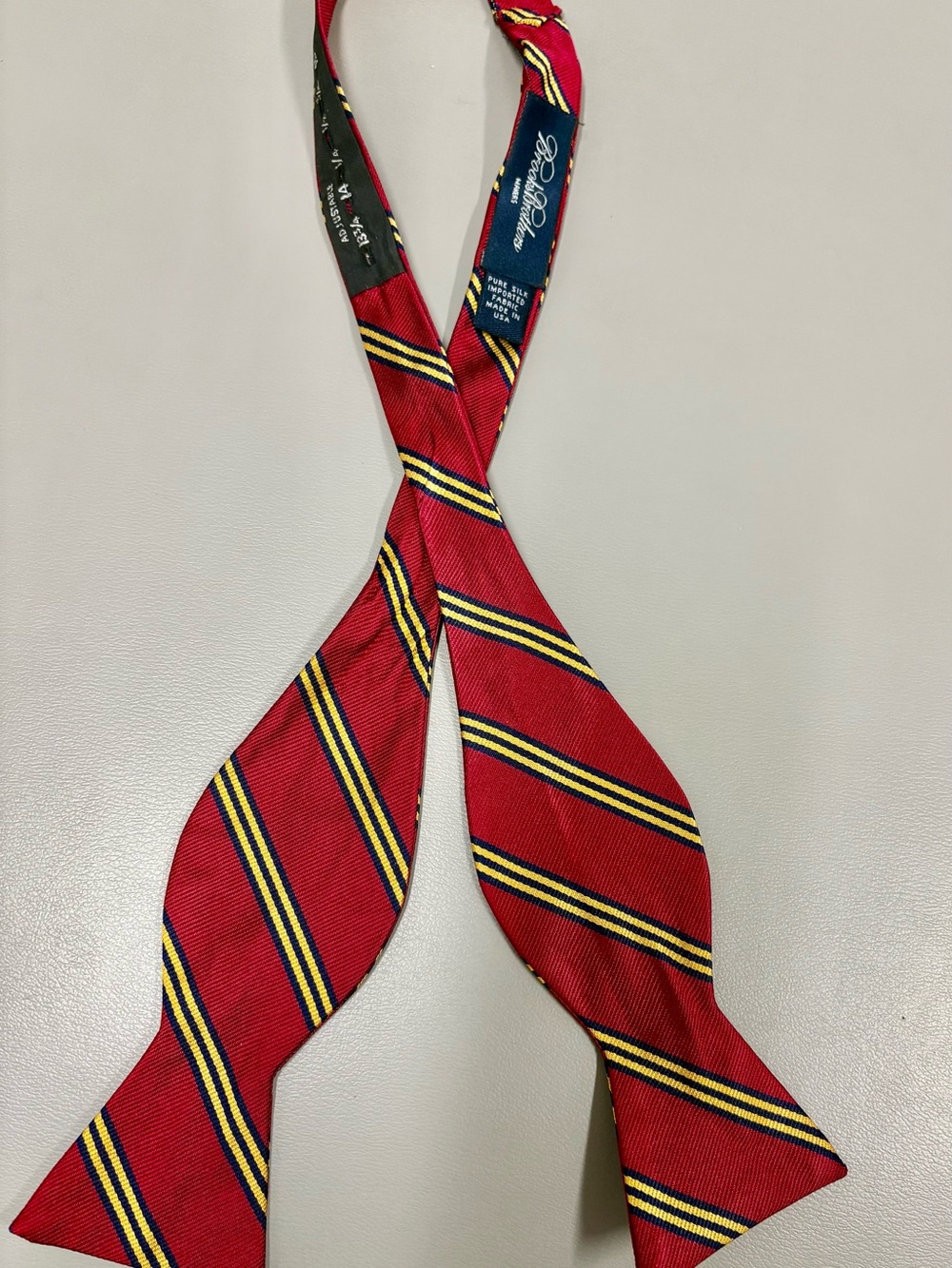 Brooks Brothers Makers Bow tie100% Silk Cromson/Red with Navy and Yellow Stripes